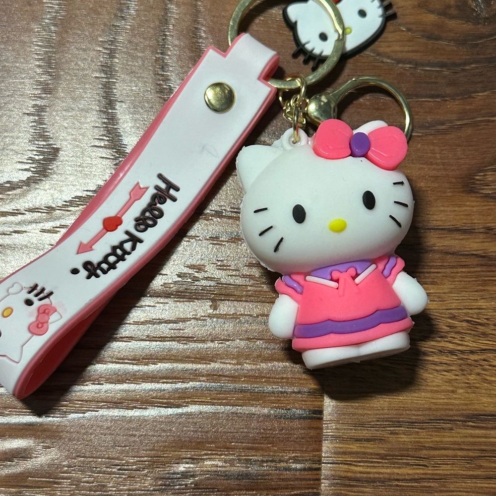 Hello Kitty Pink and Purple Doll Keychain Charm